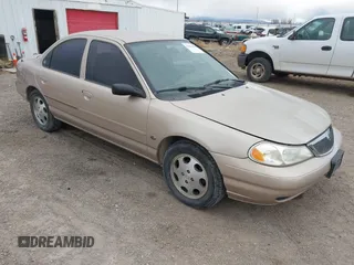 1999 Mercury Mystique GS z VIN 1MEFM6538XK606647, wystawiony jako IAAI lot #41613999 z przebiegiem 90 978 mil mil oraz . Historia ofert i sprzedaży dostępna na DreamBid. Obrazek 1.