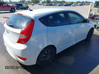 2017 Hyundai Accent SE with VIN KMHCT5AEXHU359951, listed as a IAAI auction lot 41761289 with 97,055 mi miles. Bid and sale history available at carsss.com. Image 4.