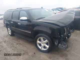 2012 Chevrolet Suburban LTZ with VIN 1GNSKKE74CR221161, listed as a IAAI auction lot 41543212 with 307,235 mi miles. Bid and sale history available at carsss.com. Image 1.