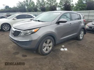 2013 Kia Sportage LX with VIN KNDPBCA24D7462827, listed as a Copart auction lot 64735705 with 87,820 mi miles and Salvage title. Bid and sale history available at DreamBid. Image 1.