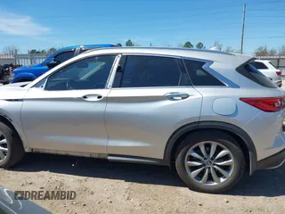 2019 Infiniti QX50 LUXE with VIN 3PCAJ5M19KF144488, listed as a IAAI auction lot 41811631 with 99,640 mi miles. Bid and sale history available at carsss.com. Image 15.