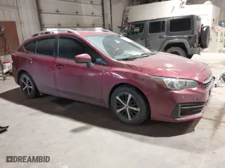 2022 Subaru Impreza Premium with VIN 4S3GTAV68N3727143, listed as a IAAI auction lot 41556570 with 62,136 mi miles. Bid and sale history available at carsss.com. Image 1.