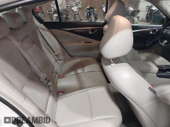 2015 Infiniti Q50 z VIN JN1BV7ARXFM409367, wystawiony jako IAAI lot #41912056 z przebiegiem 126 382 mil mil oraz . Historia ofert i sprzedaży dostępna na DreamBid. Obrazek 8.
