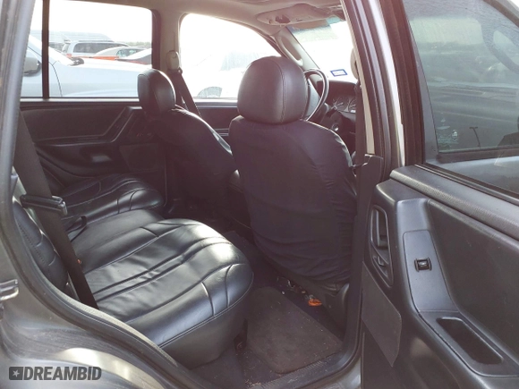 2004 Jeep Grand Cherokee Laredo with VIN 1J4GX48S14C218695, listed as a IAAI auction lot 41933611 with 158,290 mi miles. Bid and sale history available at carsss.com. Image 8.
