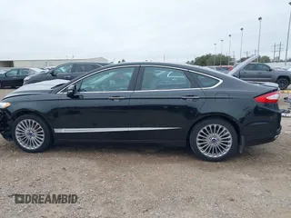2014 Ford Fusion Titanium with VIN 3FA6P0K9XER364392, listed as a IAAI auction lot 41642439 with 130,302 mi miles and . Bid and sale history available at DreamBid. Image 13.