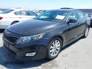 2015 Kia Optima LX with VIN KNAGM4A7XF5615069, listed as a IAAI auction lot 42234624 with 174,078 mi miles and . Bid and sale history available at DreamBid. Image 2.