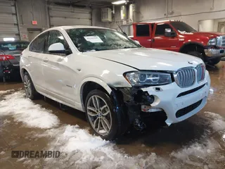 2016 BMW X4 xDrive35i with VIN 5UXXW5C54G0N92321, listed as a IAAI auction lot 41581445 with 169,498 mi miles. Bid and sale history available at carsss.com. Image 1.