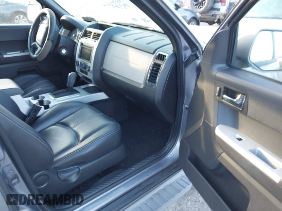 2008 Mercury Mariner Premier with VIN 4M2CU97128KJ38119, listed as a IAAI auction lot 41213121 with 76,699 mi miles and . Bid and sale history available at DreamBid. Image 5.