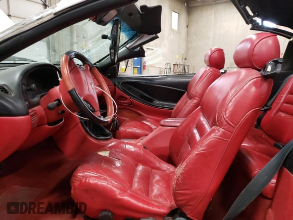 1994 Ford Mustang z VIN 1FALP45T4RF149529, wystawiony jako Copart lot #42222295 z przebiegiem 179 309 mil mil oraz Szkoda całkowita • Salvage title. Historia ofert i sprzedaży dostępna na DreamBid. Obrazek 7.
