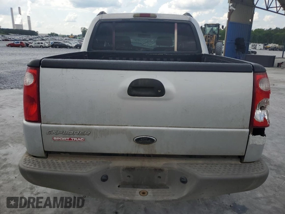 2002 Ford Explorer Sport Trac Value with VIN 1FMZU67E72UB31269, listed as a Copart auction lot 54994265 with 237,124 mi miles and Salvage title. Bid and sale history available at DreamBid. Image 6.
