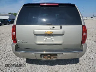2014 Chevrolet Tahoe LTZ with VIN 1GNSKCE03ER201981, listed as a Copart auction lot 56421125 with 173,710 mi miles and Salvage title. Bid and sale history available at DreamBid. Image 6.