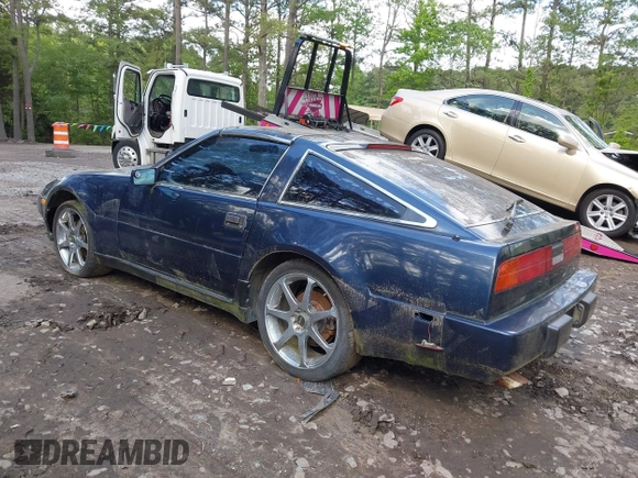 1989 Nissan 300ZX z VIN JN1HZ14S7KX290051, wystawiony jako IAAI lot #42203078 z przebiegiem 136 643 mil mil oraz . Historia ofert i sprzedaży dostępna na DreamBid. Obrazek 3.