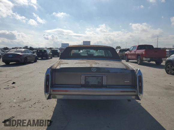 1990 Cadillac Brougham z VIN 1G6DW5476LR727151, wystawiony jako Copart lot #88145665 z przebiegiem Nie podano mil oraz Tytuł czysty. Historia ofert i sprzedaży dostępna na DreamBid. Obrazek 6.