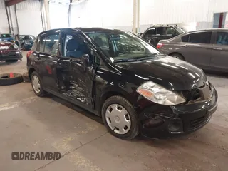 2009 Nissan Versa 1.8 S with VIN 3N1BC13E39L415491, listed as a IAAI auction lot 41614914 with 104,795 mi miles. Bid and sale history available at carsss.com. Image 1.