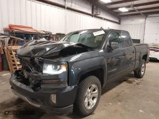 2018 Chevrolet Silverado 1500 LT with VIN 1GCVKREC8JZ318355, listed as a IAAI auction lot 41545597 with 123,895 mi miles. Bid and sale history available at carsss.com. Image 2.