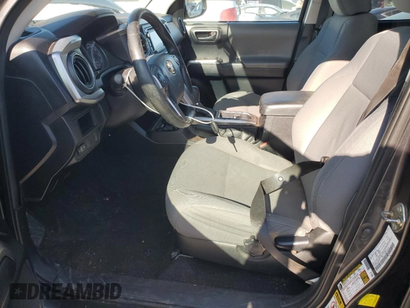 2016 Toyota Tacoma SR5 with VIN 3TMDZ5BN9GM006139, listed as a Copart auction lot 89292365 with 179,756 mi miles and Salvage Title. Bid and sale history available at DreamBid. Image 7.