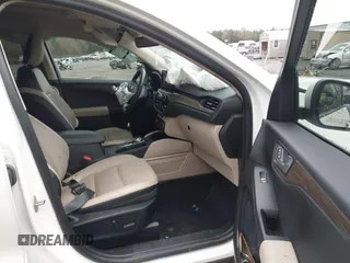 2020 Ford Escape Titanium Hybrid with VIN 1FMCU9DZ0LUC56274, listed as a IAAI auction lot 41256530 with 43,502 mi miles and . Bid and sale history available at DreamBid. Image 5.