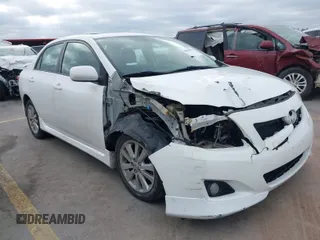 2010 Toyota Corolla with VIN 2T1BU4EEXAC521114, listed as a IAAI auction lot 42066903 with 208,509 mi miles. Bid and sale history available at carsss.com. Image 1.