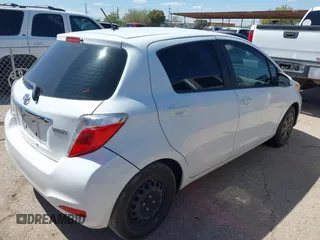 2013 Toyota Yaris L with VIN JTDKTUD36DD549289, listed as a IAAI auction lot 42132550 with 241,029 mi miles and . Bid and sale history available at DreamBid. Image 4.