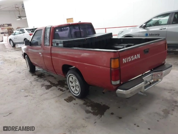 1997 Nissan Trucks 2WD XE with VIN 1N6SD16SXVC362299, listed as a IAAI auction lot 41941202 with 244,729 mi miles. Bid and sale history available at carsss.com. Image 3.