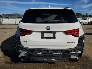 2020 BMW X3 M40i with VIN 5UXTY9C09L9B31399, listed as a Copart auction lot 87004624 with Not Provided miles and Salvage Title. Bid and sale history available at DreamBid. Image 6.