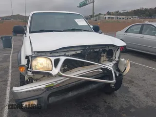 2001 Toyota Tacoma z VIN 5TEWN72N11Z820568, wystawiony jako IAAI lot #41820146 z przebiegiem 188 430 mil mil oraz . Historia ofert i sprzedaży dostępna na DreamBid. Obrazek 6.
