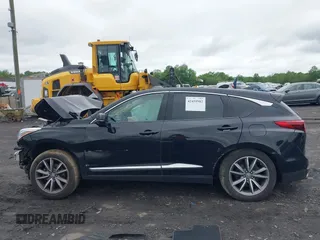 2019 Acura RDX Technology with VIN 5J8TC2H52KL030992, listed as a IAAI auction lot 42459982 with 77,042 mi miles and . Bid and sale history available at DreamBid. Image 14.