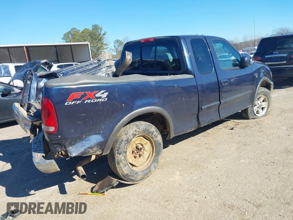 2003 Ford F-150 XL with VIN 1FTRX18L73NB36799, listed as a IAAI auction lot 41317602 with 270,075 mi miles. Bid and sale history available at carsss.com. Image 4.