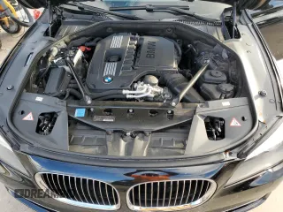 2011 BMW 7 Series 740i with VIN WBAKA4C59BC392351, listed as a Copart auction lot 84942304 with 76,874 mi miles and Salvage Title. Bid and sale history available at carsss.com. Image 11.