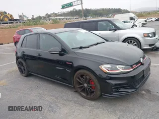 2019 Volkswagen Golf GTI S with VIN 3VW5T7AU3KM005648, listed as a IAAI auction lot 42096528 with 57,352 mi miles. Bid and sale history available at carsss.com. Image 1.