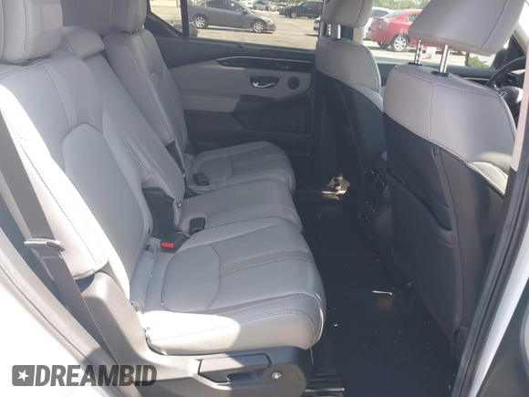 2024 Honda Pilot Touring z VIN 5FNYG2H72RB016937, wystawiony jako IAAI lot #42137854 z przebiegiem 18 028 mil mil oraz . Historia ofert i sprzedaży dostępna na DreamBid. Obrazek 8.
