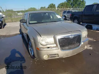 2009 Chrysler 300 Limited with VIN 2C3KA33V99H592963, listed as a IAAI auction lot 42041417 with 160,829 mi miles. Bid and sale history available at carsss.com. Image 1.