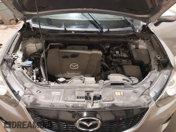 2015 Mazda CX-5 Grand Touring with VIN JM3KE4DY2F0477966, listed as a IAAI auction lot 41247178 with 116,582 mi miles. Bid and sale history available at carsss.com. Image 10.
