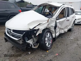 2012 Dodge Journey Crew with VIN 3C4PDCDG7CT165224, listed as a IAAI auction lot 41568580 with 140,211 mi miles and . Bid and sale history available at DreamBid. Image 2.
