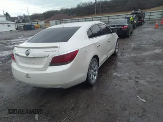 2012 Buick LaCrosse Leather z VIN 1G4GC5E32CF218413, wystawiony jako IAAI lot #41747477 z przebiegiem 135 978 mil mil oraz . Historia ofert i sprzedaży dostępna na DreamBid. Obrazek 4.