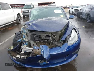 2022 Tesla Model 3 Performance with VIN 5YJ3E1EC7NF306192, listed as a IAAI auction lot 41453931 with 36,450 mi miles. Bid and sale history available at carsss.com. Image 11.