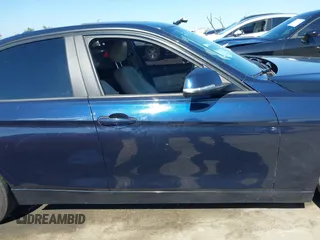 2015 BMW 3 Series 328i with VIN WBA3C1C50FK124300, listed as a IAAI auction lot 40112372 with 142,591 mi miles and . Bid and sale history available at carsss.com. Image 13.