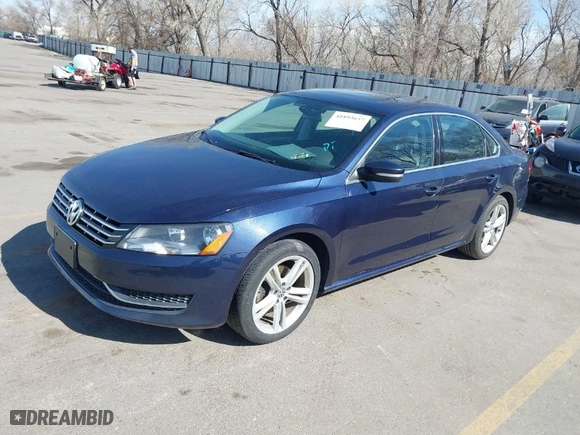 2014 Volkswagen Passat TDI SE w/Sunroof with VIN 1VWBN7A30EC055207, listed as a IAAI auction lot 41893637 with 133,074 mi miles. Bid and sale history available at carsss.com. Image 2.