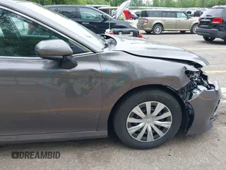 2019 Toyota Camry Hybrid LE z VIN 4T1B31HK4KU511360, wystawiony jako IAAI lot #42298260 z przebiegiem 133 019 mil mil oraz . Historia ofert i sprzedaży dostępna na DreamBid. Obrazek 19.