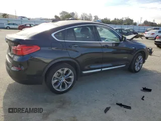 2016 BMW X4 xDrive28i with VIN 5UXXW3C50G0R22606, listed as a Copart auction lot 67657412 with 65,119 mi miles. Bid and sale history available at carsss.com. Image 3.