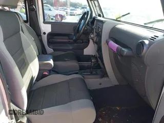 2007 Jeep Wrangler Unlimited X with VIN 1J4GB39147L199367, listed as a IAAI auction lot 40897772 with 229,309 mi miles and . Bid and sale history available at DreamBid. Image 5.