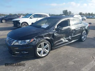 2016 Volkswagen CC Sport with VIN WVWBP7AN8GE502338, listed as a IAAI auction lot 41535048 with 71,645 mi miles. Bid and sale history available at carsss.com. Image 2.