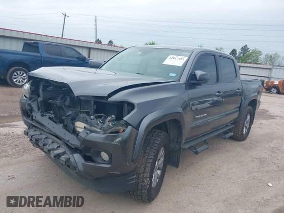 2018 Toyota Tacoma SR5 with VIN 5TFAZ5CN5JX062498, listed as a IAAI auction lot 41867393 with 128,879 mi miles and . Bid and sale history available at DreamBid. Image 18.