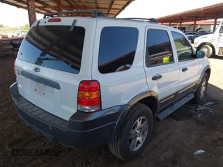2005 Ford Escape XLT with VIN 1FMCU93145KB07103, listed as a IAAI auction lot 42571848 with 87,616 mi miles and . Bid and sale history available at DreamBid. Image 4.