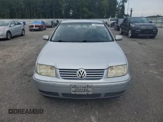 2004 Volkswagen Jetta GL with VIN 3VWRR69M34M108439, listed as a Copart auction lot 74029704 with 296,984 mi miles and Salvage title. Bid and sale history available at DreamBid. Image 5.
