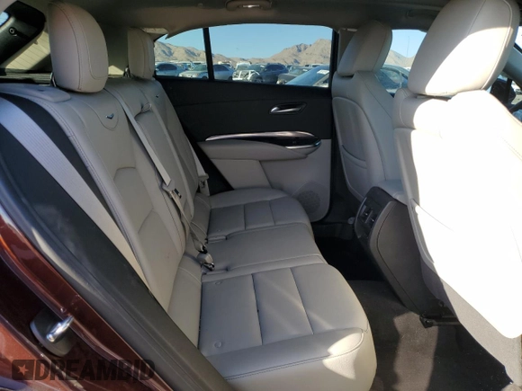 2023 Cadillac XT4 AWD Luxury with VIN 1GYFZBR42PF107893, listed as a Copart auction lot 74989124 with 9,579 mi miles and Salvage Title. Bid and sale history available at carsss.com. Image 12.