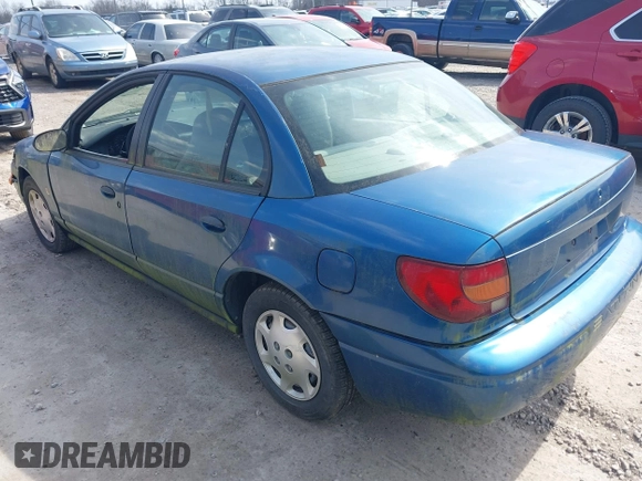 2002 Saturn SL z VIN 1G8ZG52822Z132267, wystawiony jako IAAI lot #41906634 z przebiegiem 144 001 mil mil oraz . Historia ofert i sprzedaży dostępna na DreamBid. Obrazek 3.