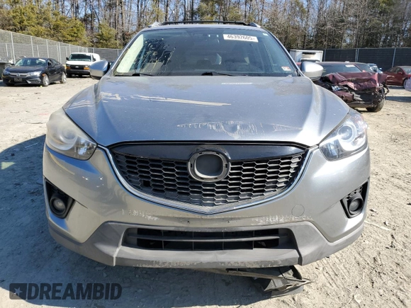 2015 Mazda CX-5 Grand Touring with VIN JM3KE4DY5F0460465, listed as a Copart auction lot 46392605 with 103,185 mi miles and Salvage Title. Bid and sale history available at carsss.com. Image 5.