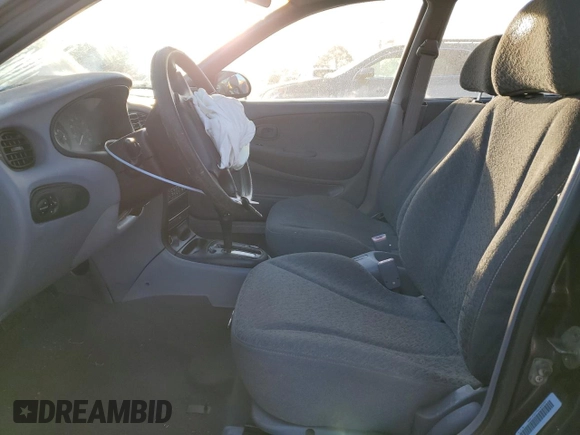 1999 Hyundai Elantra с VIN KMHJF25F9XU833791, выставлен на аукционе Copart как лот 77899654 с пробегом 60 396 миль миль и Списание • Salvage title. История ставок и продаж доступна на DreamBid. Изображение 7.
