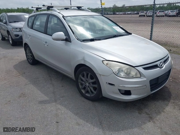 2012 Hyundai Elantra Touring SE with VIN KMHDC8AE0CU130029, listed as a IAAI auction lot 41918117 with 171,555 mi miles. Bid and sale history available at carsss.com. Image 1.